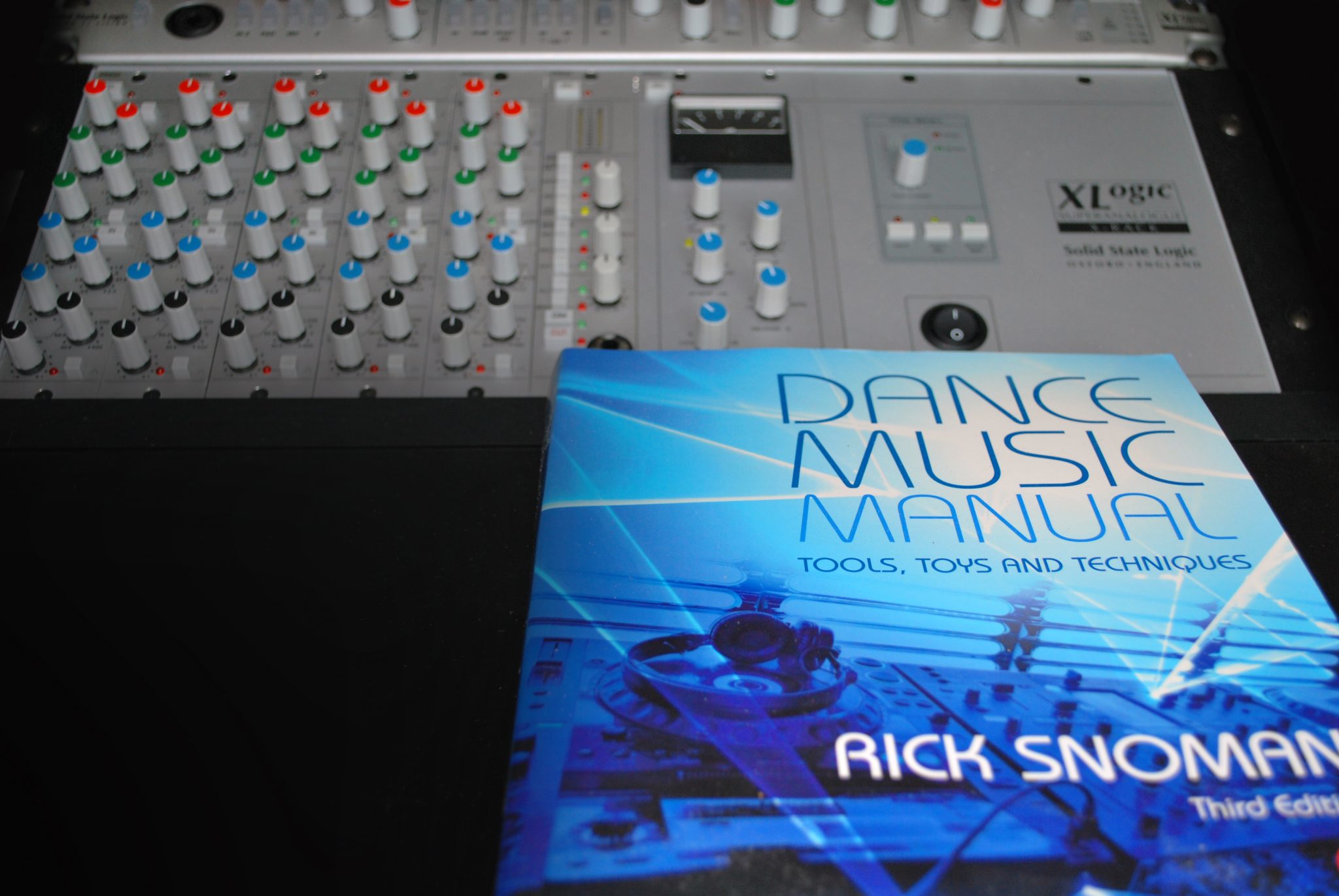 Dance Music Manual on a desk